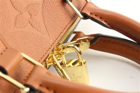 lv speedy cognac|Louis Vuitton Speedy 25 Empreinte Cognac vs. Speedy 25.